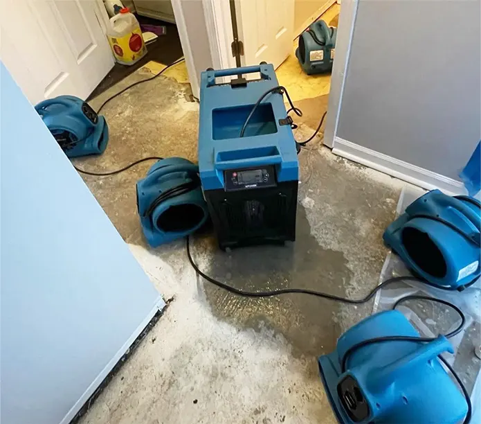 Blue air movers drying a wet floor in Altamonte Springs, FL