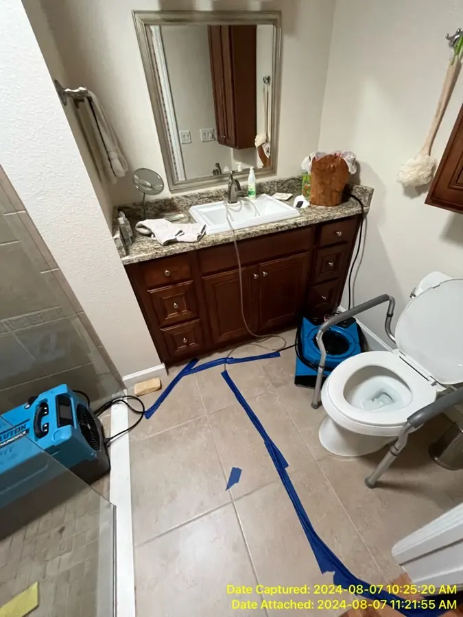 Bathroom dried after a toilet overflow in Altamonte Springs, FL